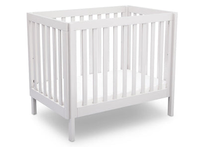 Delta Children White (130) Bennington Elite Mini Crib with Mattress, Angled View, a3a