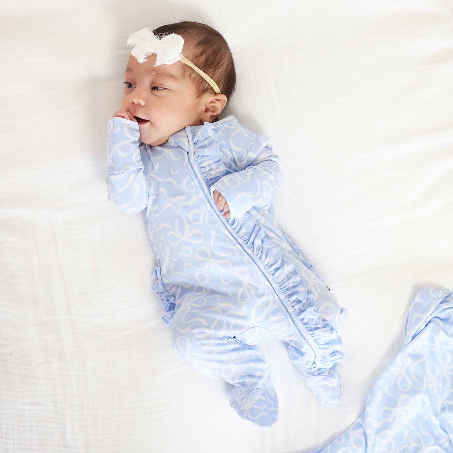 Blue-tiful Bows Ruffle Zipper Footie