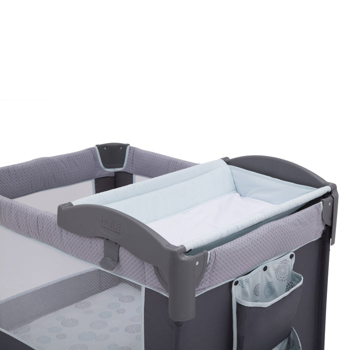 Delta Children Eclipse (2063) LX Deluxe Play Yard, angled view, a2a