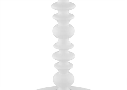 White decorative object with a spiral design on a white background