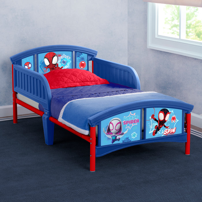 Children's bed with Spider-Man design in a room with a window.