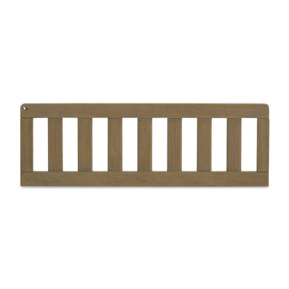 Wooden baby crib rail on a white background
