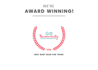 Little Folks by Delta Children Aqua Geo (2040) Twin EZ Fold Ultra Compact Double Bassinet Badge